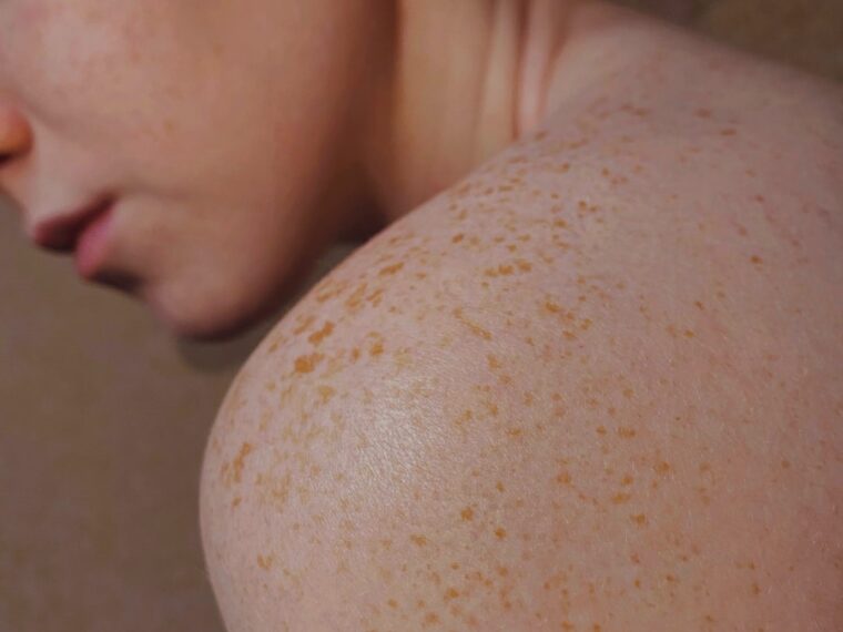 topless woman with brown hair